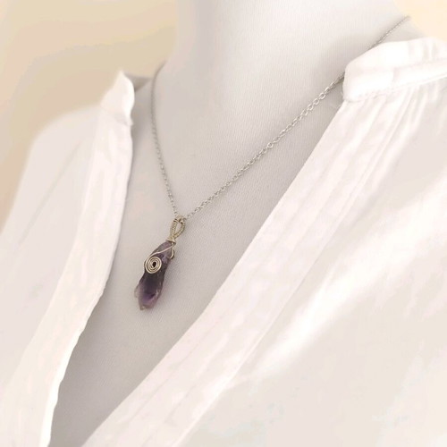 Amethyst wire-wrapped pendant on steel chain