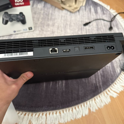 Sony PlayStation 3 Slim 160GB console used with original controller