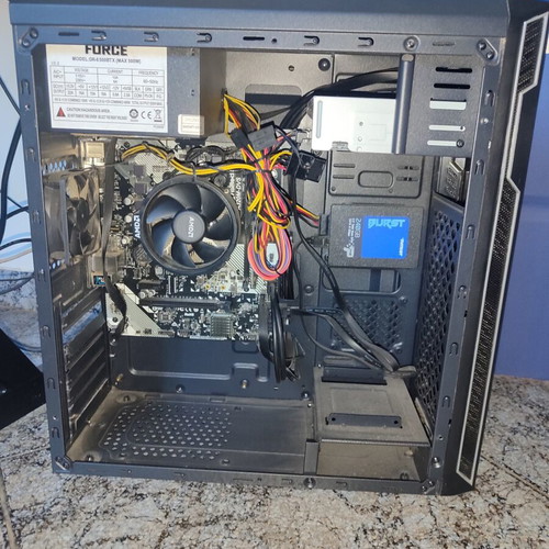 Complete computer system used with AMD Ryzen 3 2200G and LG monitor
