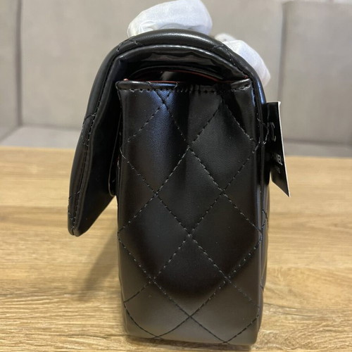Quilted shoulder bag like new, black