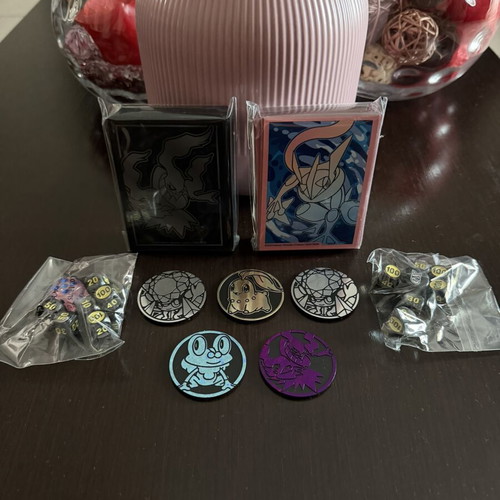 Pokémon Sleeves with Coins and Dice new from Pitch Black and Chaos Rising ETB