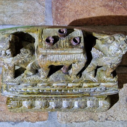 Antique carved stone decoration of Asian temple used