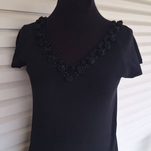 Black blouse new with decorative organza roses neckline, size M