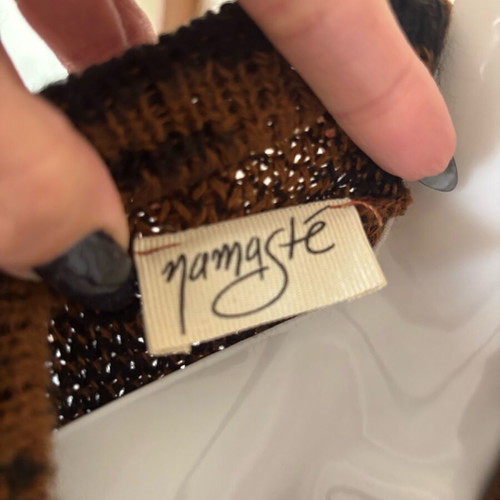 Namaste sweater size M like new, black and brown