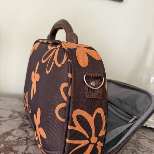 Travel Toiletry Bag like new, brown and orange floral design