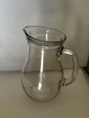 Glass pitcher old used in good condition