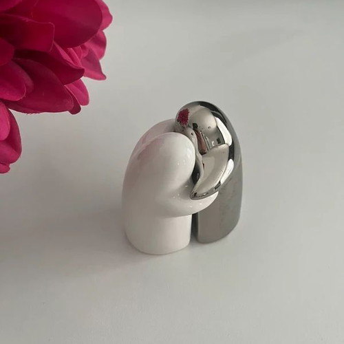 Porcelain hugging ghost salt and pepper shakers like new