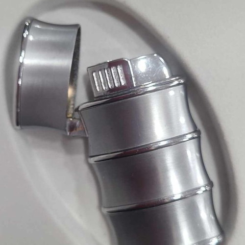 Silver lighter new with box, refillable with gas