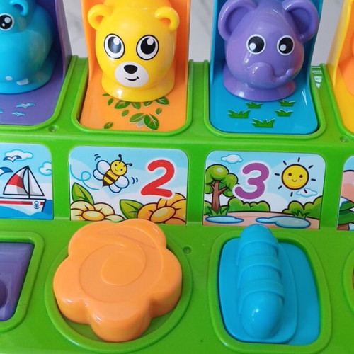 Interactive baby toy suitcase with animal sounds and pop-up features