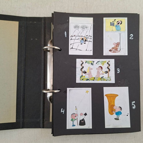 103 Cartoons by Kyr and 8 Cigarette Papers in Folder used