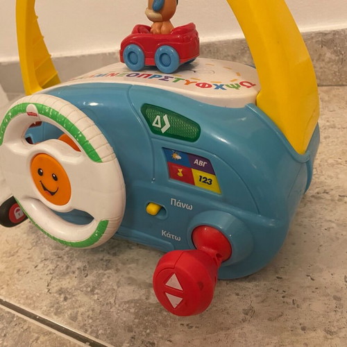 Fisher Price driving toy used with sounds and activities