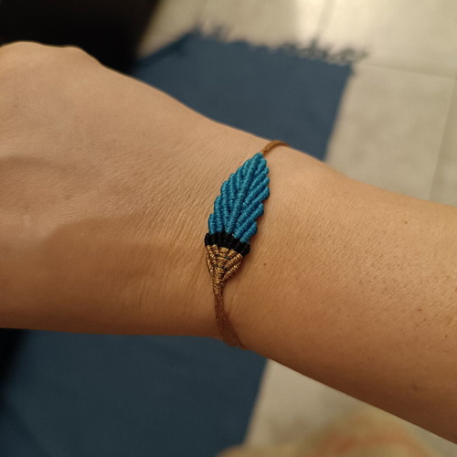 Macrame feather bracelet with adjustable clasp
