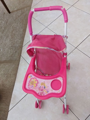 Doll stroller used with wear and fabric tears