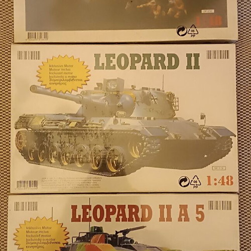 Modeling kit new, three sealed boxes with 1:48 scale tanks and motors