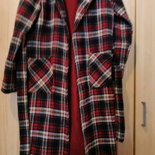 Checked coat size Small like new with belt and stitched pockets