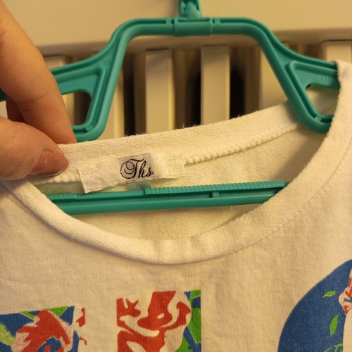 Ths Fashion sleeveless women's top medium size like new, multicolor
