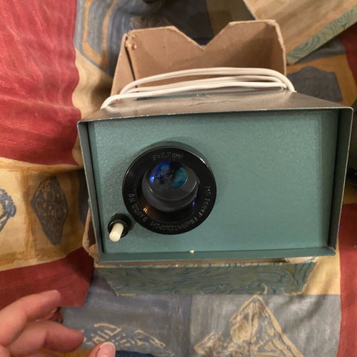 Vintage film projector used with children's movie film