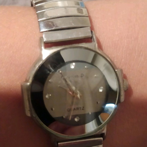 Women's watch used with elastic grey silver bracelet