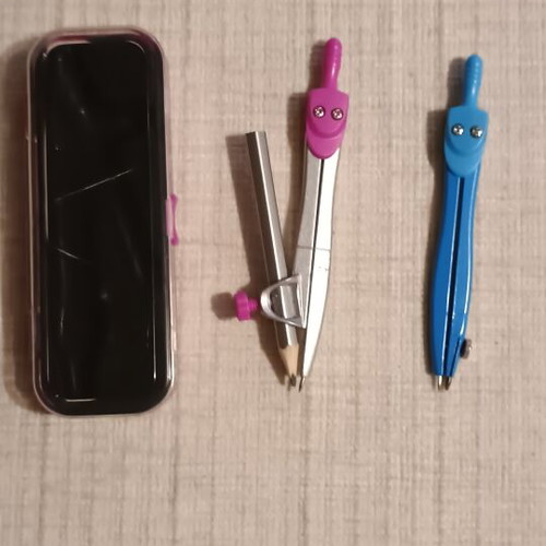Set of two compasses with pink storage case like new