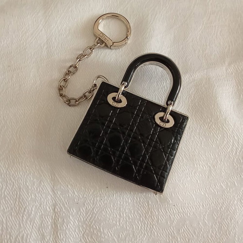 Christian Dior keychain with lipstick, like new, black and silver