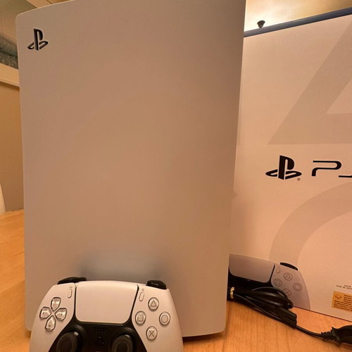 PlayStation 5 and DualSense like new, with box, 1TB