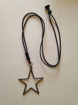 Star pendant used, silver with black cord