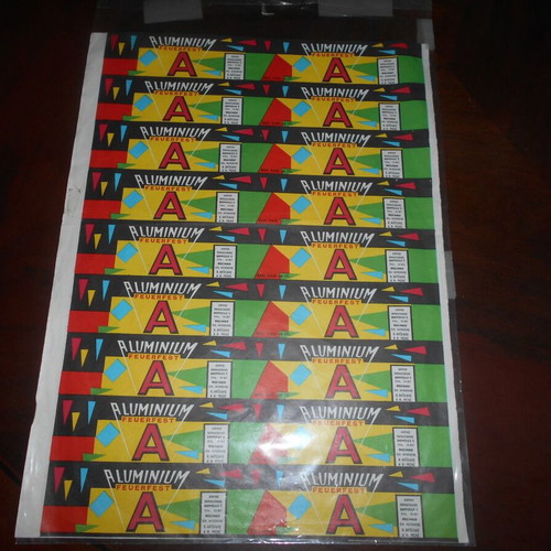 Aluminium promotional labels used on typographic sheet 23.5x32cm