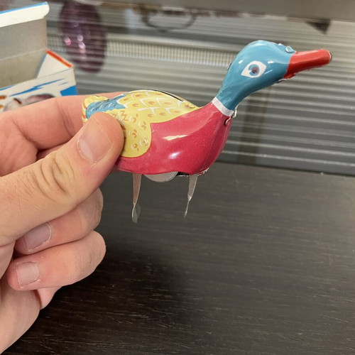 Tin duck vintage toy used with original box, Chinese made