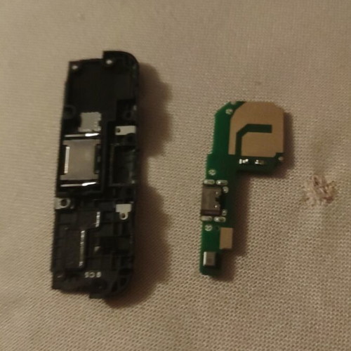 Redmi 6A charging port with antenna cable and speaker