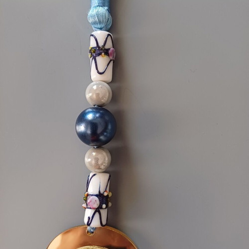 Key charm new with eye made of plexiglass and blue tassel