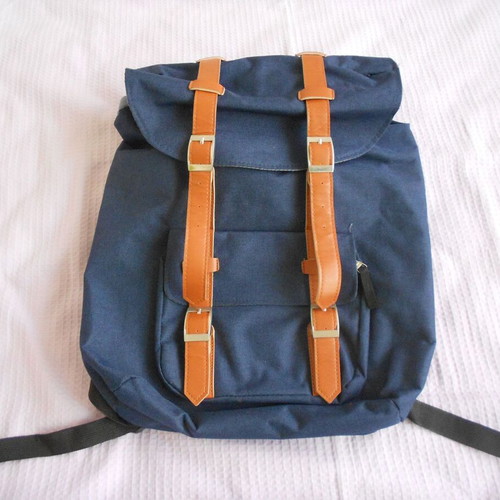 Backpack like new, dark blue with brown details