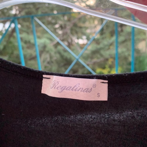 Regalinas black blouse used with lace and sleeve details