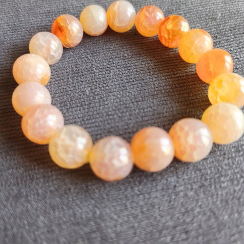 Bracelet with orange beads elastic, like new