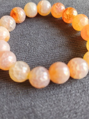 Bracelet with orange beads elastic, like new