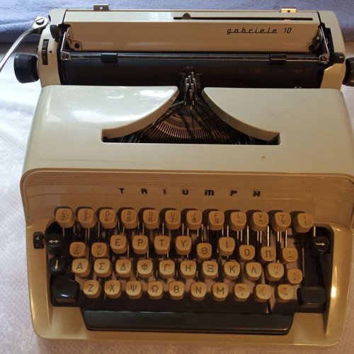 Triumph Gabriele typewriter used with carrying case