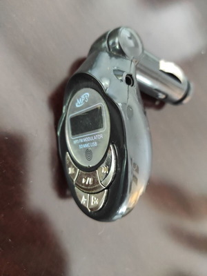 MP3/FM modulator car adapter used