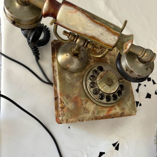 Antique rotary phone used with nephrite