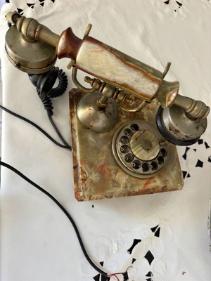 Antique rotary phone used with nephrite
