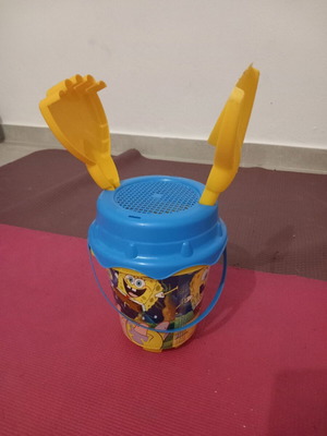 SpongeBob Beach Bucket used with shovel and rake