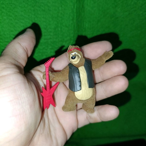 Masha and the Bear Bear figure used with electric guitar