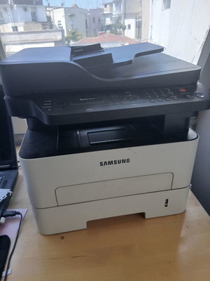 Samsung photocopier and printer like new, minor lid repair needed