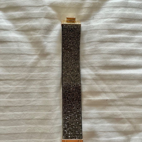 Bracelet with rhinestones used, black and silver with gold clasp