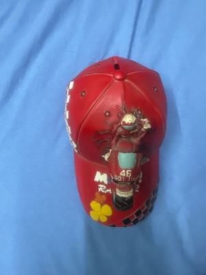 Coin bank machine-hat used, clay-like