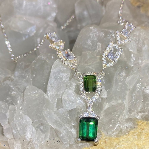Silver necklace with natural indicolite, green tourmaline, topaz and moissanite