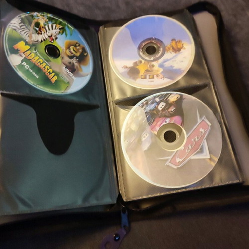CD/DVD storage case used, 48 slots with zipper
