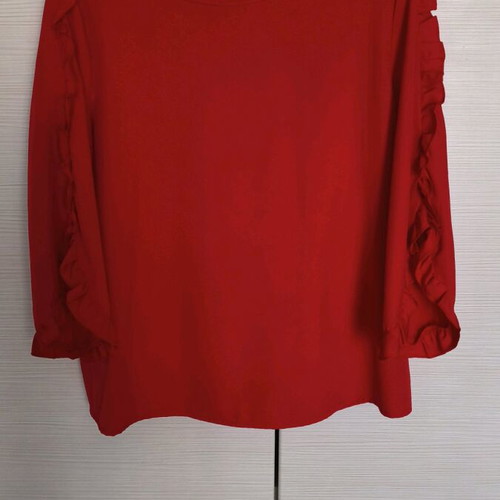 Women's red blouse with ruffles like new, size L
