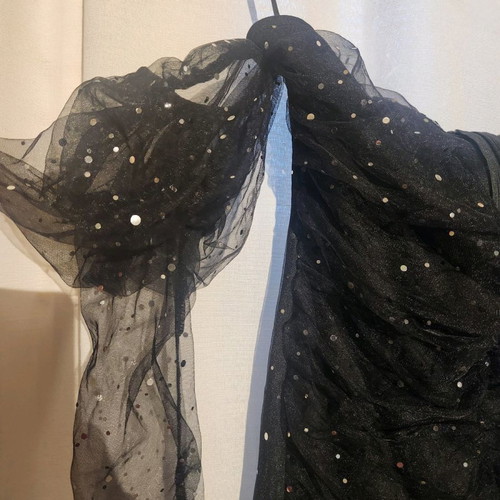 Black evening dress with V neckline and sheer sleeves in very good condition