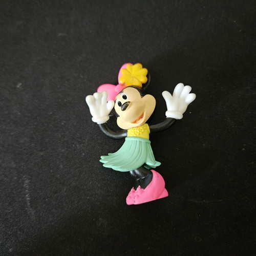 Peppa and Minnie figures used with minor paint wear