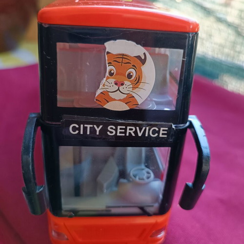 Toy bus used with lights and sounds