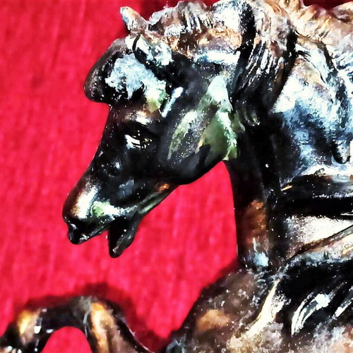 Bronze horse on wooden base like new